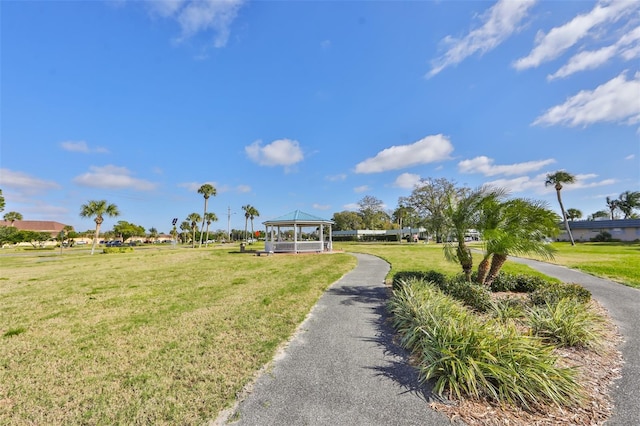 surrounding community featuring a yard and a gazebo