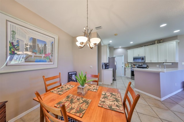 dining space with a chandelier, light tile patterned flooring, recessed lighting, visible vents, and baseboards