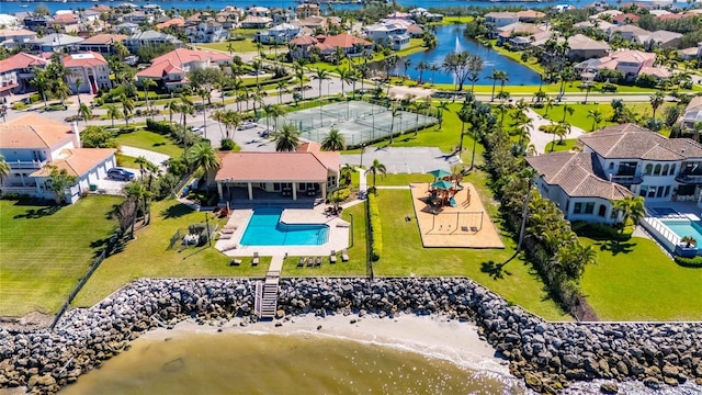 1335 Jumana Loop, Apollo Beach, FL 33572 - aerial perspective of suburban area featuring a pool and a large body of water
