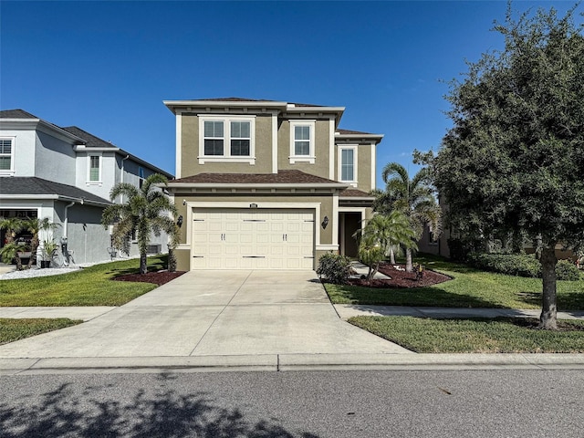 29011 Trevi Pl, Wesley Chapel, FL 33543 - view of front of property featuring an attached garage, driveway, a front yard, and stucco siding