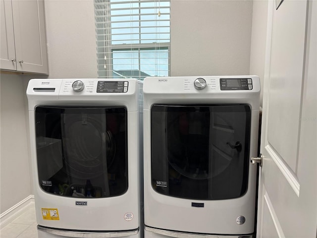 29011 Trevi Pl, Wesley Chapel, FL 33543 - washroom with cabinet space, independent washer and dryer, and tile patterned floors