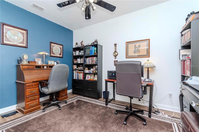 office area with ceiling fan