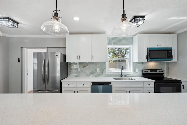 kitchen featuring a sink, electric stove, freestanding refrigerator, dishwasher, and crown molding