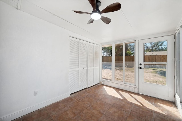 interior space with a ceiling fan