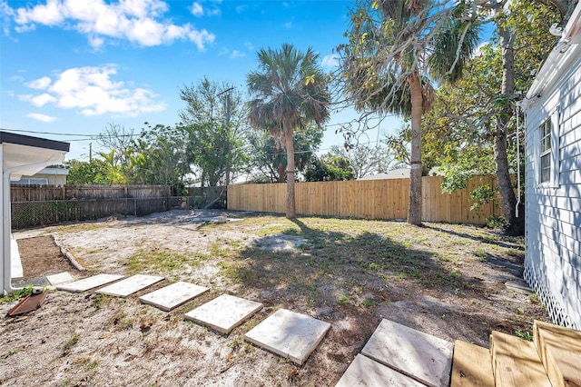 view of yard featuring a fenced backyard