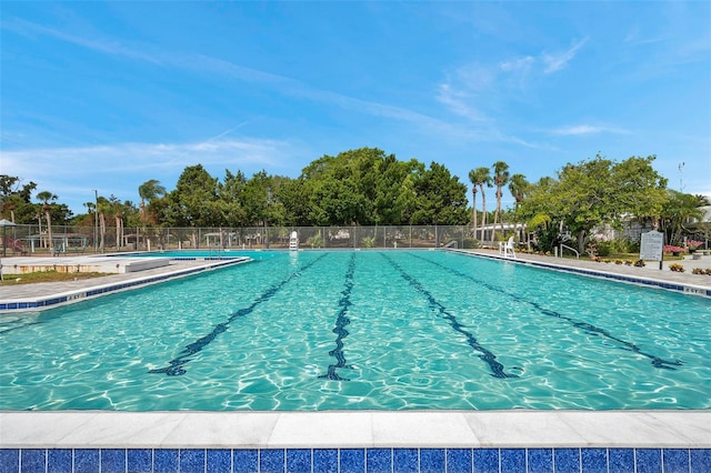 community pool with fence