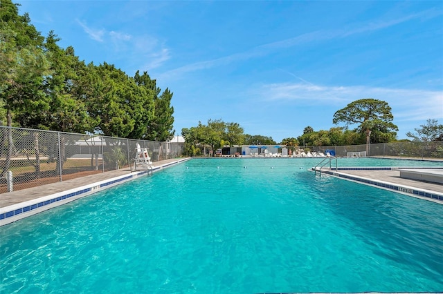 pool featuring fence