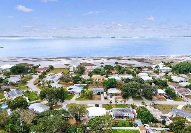 bird's eye view featuring a residential view and a water view