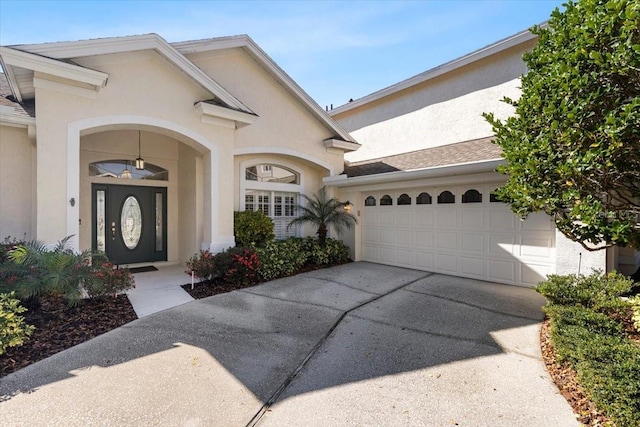 view of front of property with a garage