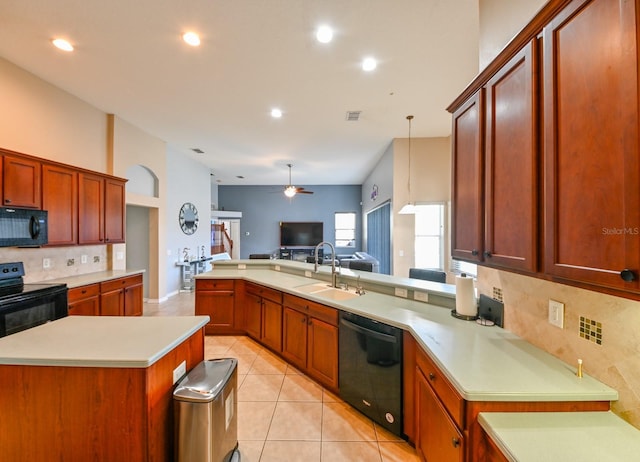 kitchen featuring light tile patterned flooring, pendant lighting, sink, backsplash, and black appliances