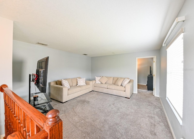 living room featuring light colored carpet