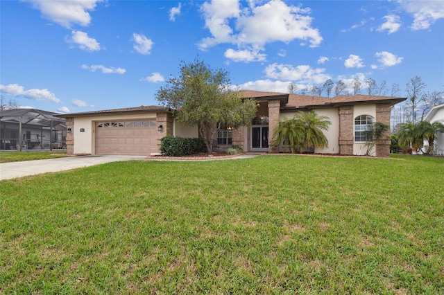 view of front of property with a garage, concrete driveway, a front yard, and stucco siding