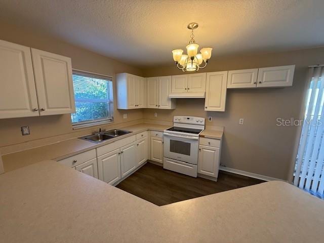 kitchen featuring white electric stove, decorative light fixtures, a chandelier, sink, and white cabinetry