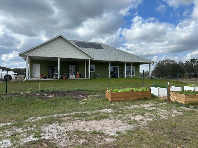 view of front of home with a front lawn