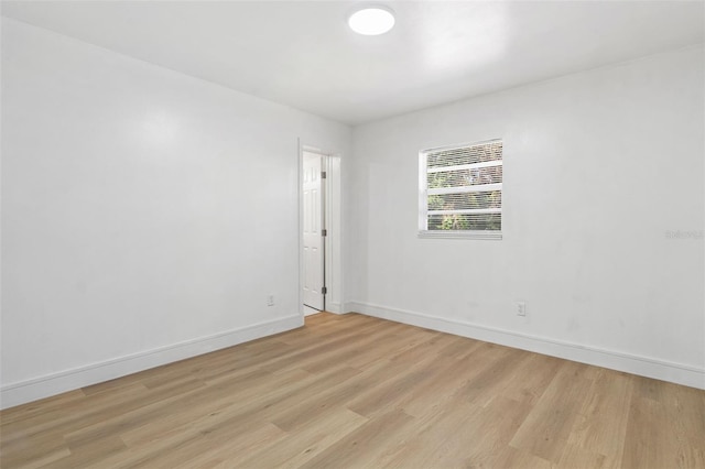 1212 E Crawford St, Tampa, FL 33604 - unfurnished room with light wood-style floors and baseboards
