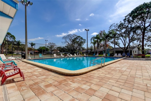 view of swimming pool with a patio area