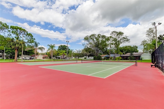 view of tennis court with basketball court