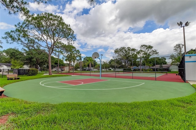 view of sport court featuring tennis court