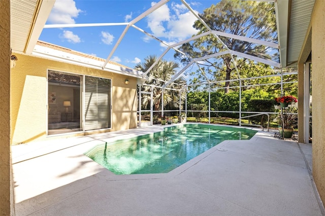 pool featuring a patio area and a lanai