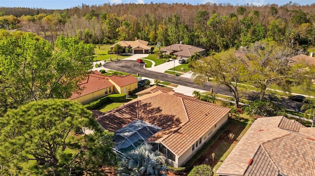 aerial view with a wooded view