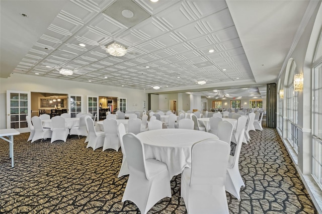 dining area with an ornate ceiling and carpet floors