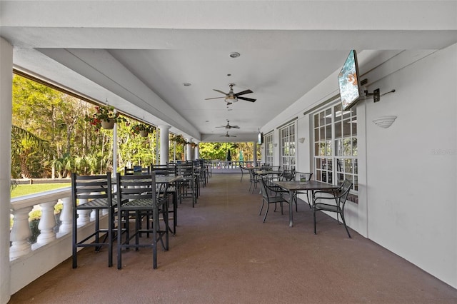 view of patio / terrace with outdoor dining area and ceiling fan