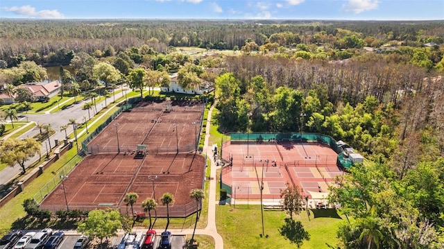 drone / aerial view featuring a view of trees