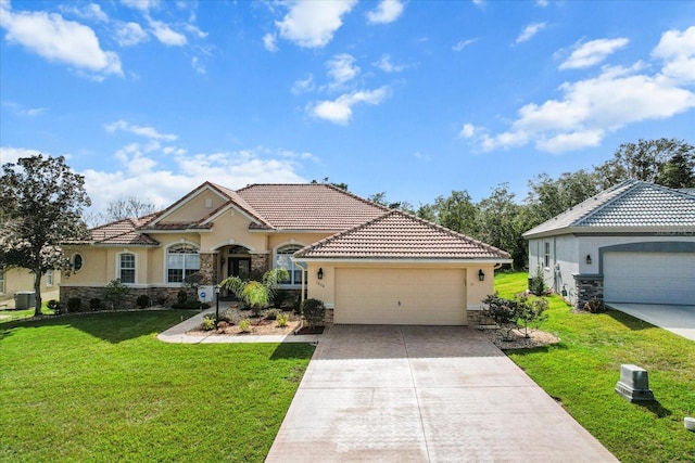 mediterranean / spanish house with a front lawn, a garage, and central air condition unit