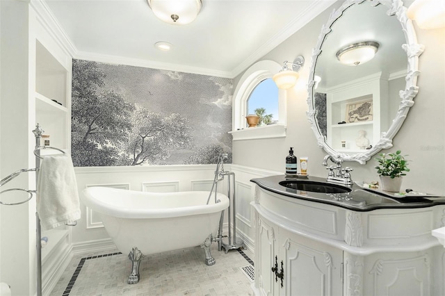 bathroom featuring vanity, ornamental molding, and a bathing tub