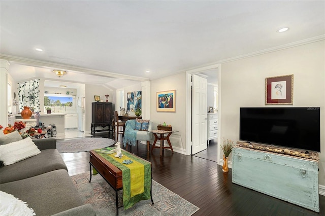 living room with crown molding and dark hardwood / wood-style floors