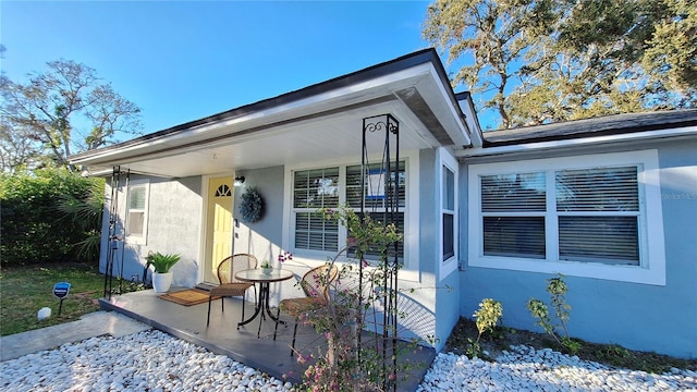 view of front of property featuring stucco siding