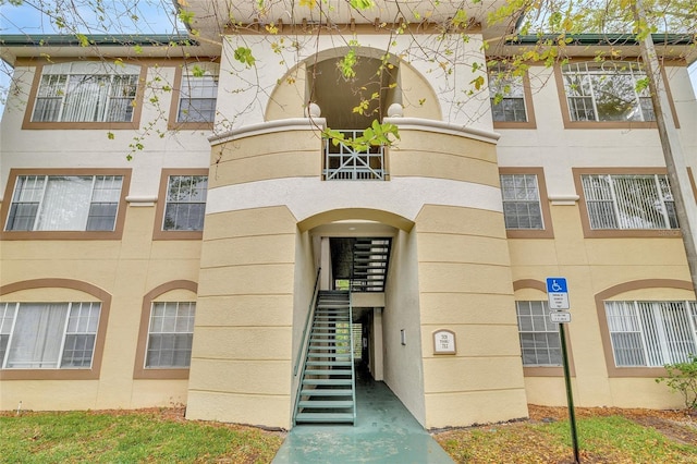 view of building exterior with stairway