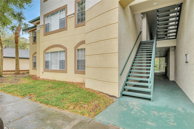 view of home's exterior with stairway