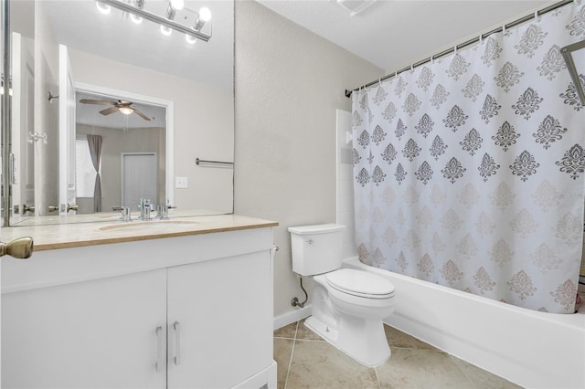 full bath featuring ceiling fan, toilet, tile patterned floors, shower / bath combination with curtain, and vanity