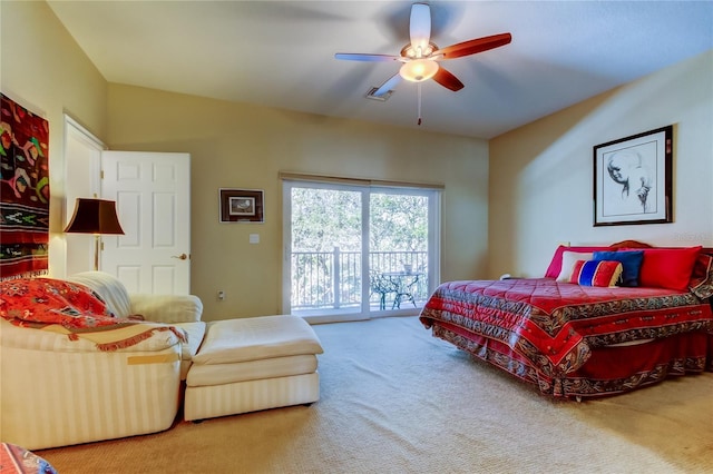 bedroom featuring carpet floors, access to outside, and a ceiling fan