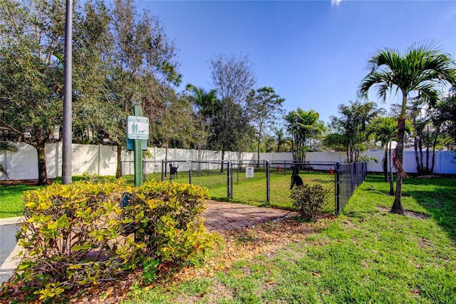 view of yard with a gate and fence