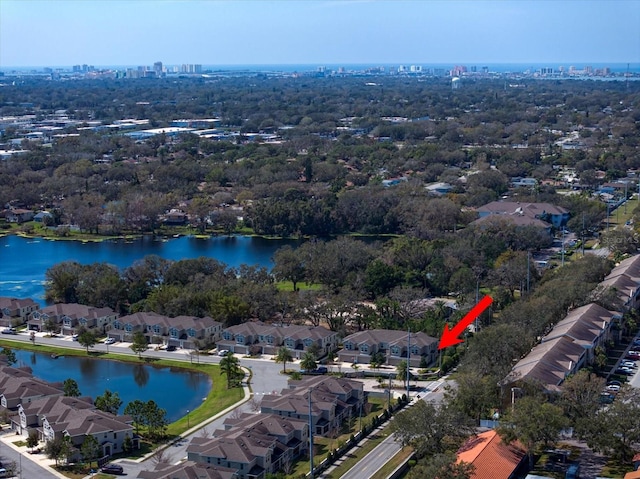 birds eye view of property featuring a water view and a residential view