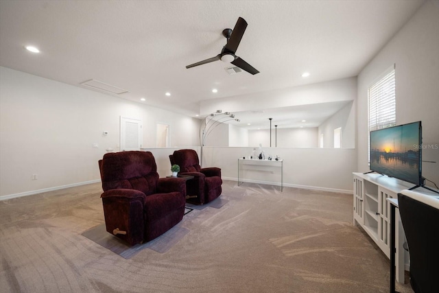 sitting room featuring ceiling fan, recessed lighting, light colored carpet, visible vents, and baseboards