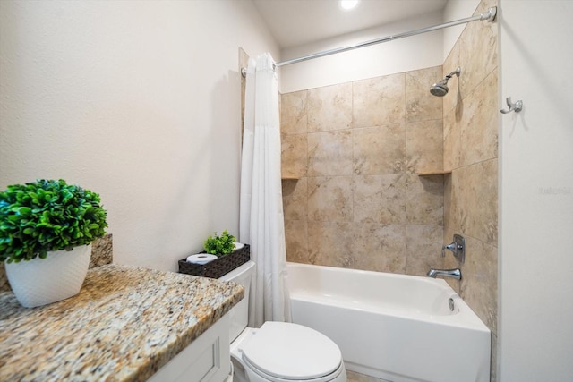 bathroom featuring shower / bath combination with curtain and toilet