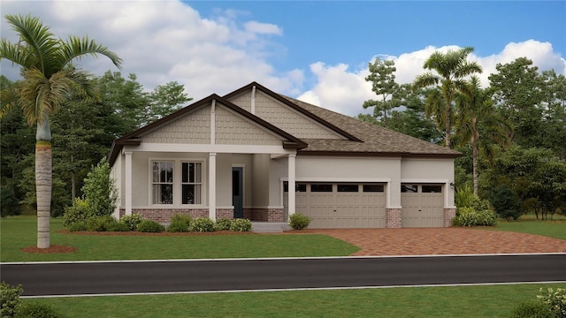 craftsman-style home with a front lawn and a garage