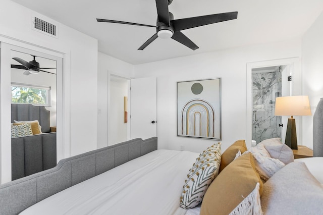 bedroom with visible vents and ceiling fan