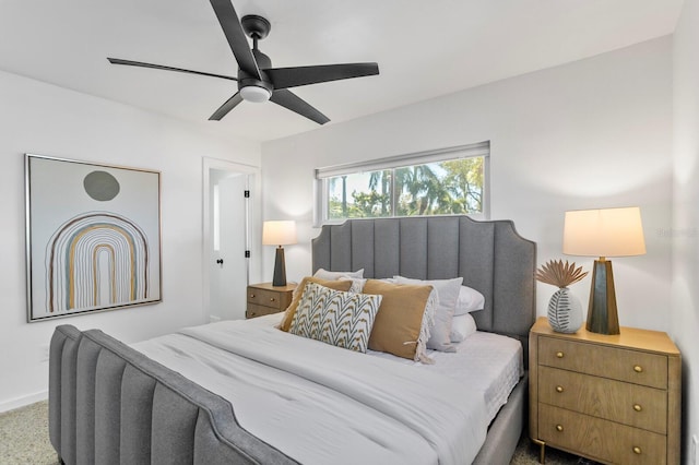 bedroom featuring a ceiling fan and baseboards