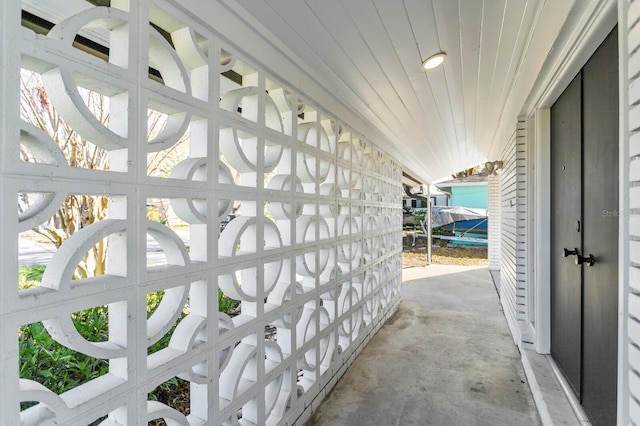 sunroom / solarium with vaulted ceiling and wood ceiling