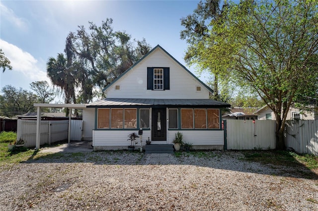 view of front of house with a carport