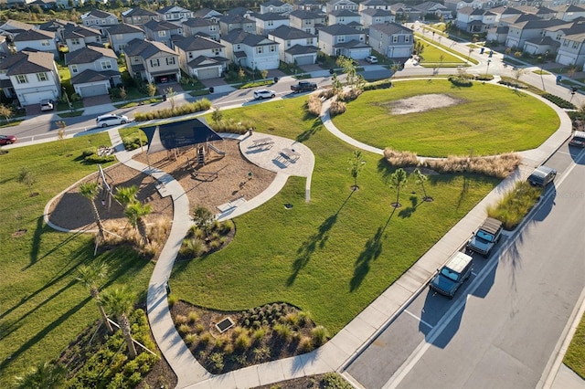 birds eye view of property with a residential view