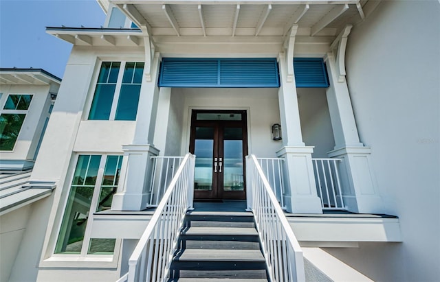 entrance to property featuring french doors