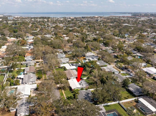 aerial view with a residential view and a water view