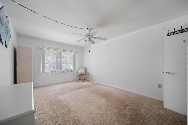 2113 Canal Dr Unit B2, Bradenton, FL 34207 - carpeted empty room featuring ceiling fan