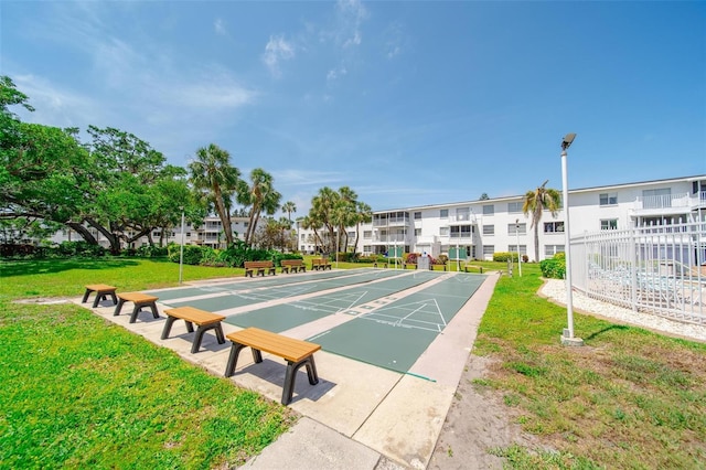 2113 Canal Dr Unit B2, Bradenton, FL 34207 - view of home's community with shuffleboard and a yard