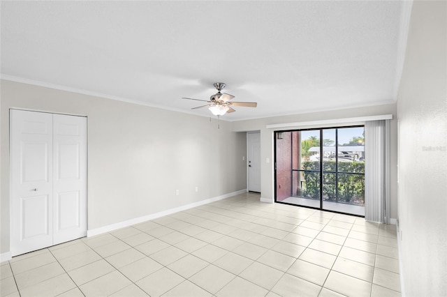 5618 Baywater Dr Unit 5618, Tampa, FL 33615 - unfurnished room with a ceiling fan, ornamental molding, light tile patterned floors, and baseboards
